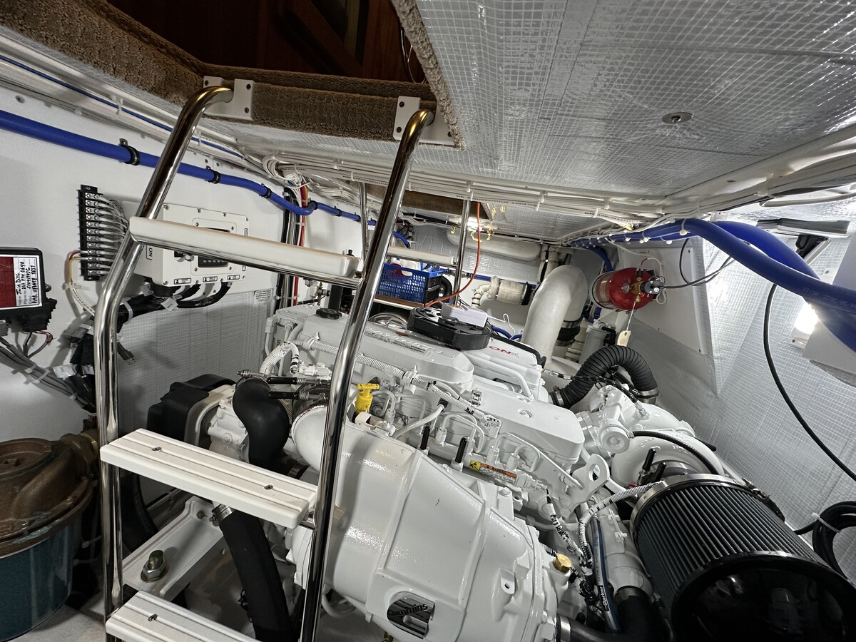 Boat engine room in a metal hull, a tight space that makes wireless signal and winter monitoring more difficult.